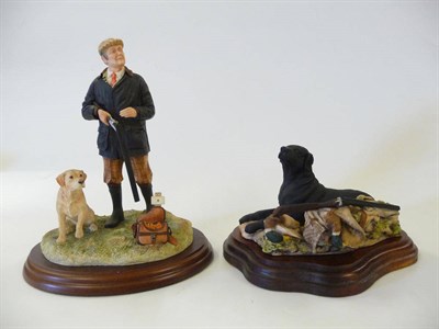 Lot 1033 - Border Fine Arts Black 'Labrador and Gun', model No. 052A by Anne Wall, 8.9cm high on wood base and