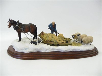 Lot 1037 - Border Fine Arts 'Winter Feeding' shepherd with pony and sheep in snow, model No. JH10 by Judy...