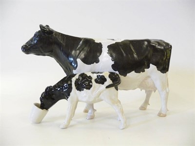 Lot 1094 - Shebeg Friesian Cow modelled by John Harper, Isle of Man, black and white satin matt, 14.8cm...