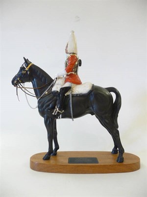 Lot 1108 - Beswick Life Guard mounted on black horse, model No. 2562, style two with sword, matt, 36.8cm...