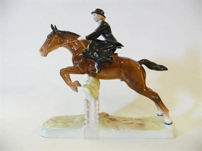 Lot 1115 - Beswick Huntswoman on Jumping Brown Horse, model No. 982, gloss, 25.4cm high (af)