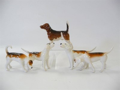 Lot 1116 - Four Beswick Fox Hounds, models 941, 944, 2262, 2265 and a Beswick Beagle 'Wendover Billy',...