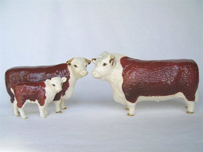 Lot 1123 - Beswick Hereford Bull, Cow and Calf, models 1363B, 1360 and 1827C, all red/brown and white...