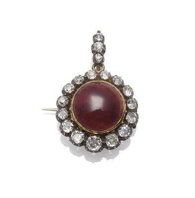 Lot 348 - An Early 19th Century Garnet and Diamond Brooch/Pendant, a round carbuncle garnet centrally, with a