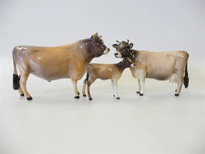 Lot 1134 - Beswick Jersey Bull Ch. 'Dunsley Coy Boy', model No. 1422, 11.9cm high; Jersey Cow Ch. 'Newton...