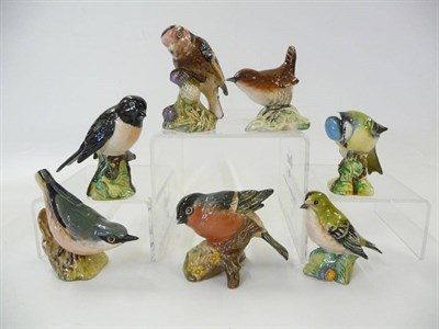 Lot 1138 - Seven Beswick Birds, Blue Tit, first version 992A Wren, 993; Nuthatch, 2413; Bullfinch, 1042;...