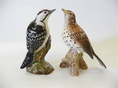 Lot 1139 - Beswick Lesser Spotted Woodpecker, model No. 2420, black, white and red gloss, 14cm high and...