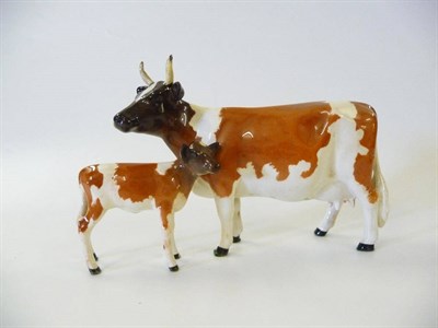 Lot 1169 - Beswick Ayrshire Cow Ch. 'Ickham Bessie', model No. 1350, 12.7cm and Ayrshire Calf, No. 1249B,...