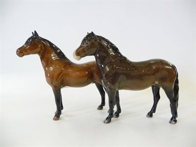 Lot 1176 - Beswick Exmoor Pony 'Heatherman', model No. 1645, bay gloss, 16.5cm high and Dartmoor Pony...