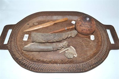 Lot 21 - An African spear, a hardwood tray, an Earthenware pot, two Earthenware figures, a hair ornament and