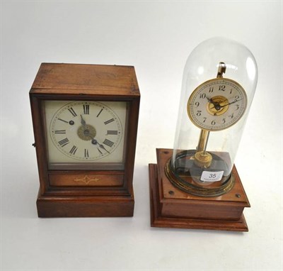 Lot 35 - An electric mantel clock and an alarm mantel clock, movement stamped W & H (2)