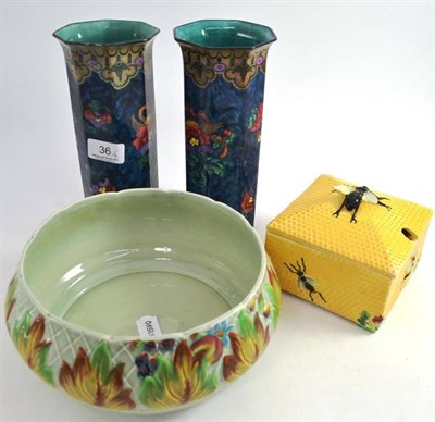 Lot 36 - A Newport pottery Clarice Cliff bowl, pair of vases, Crown Devon Honey Comb dish and cover