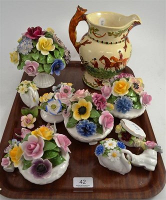 Lot 42 - Fielding's John Peel musical jug and fourteen flower encrusted ornaments