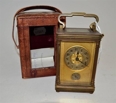 Lot 54 - A brass carriage clock with key and case