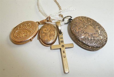 Lot 90 - Three gold lockets and a crucifix