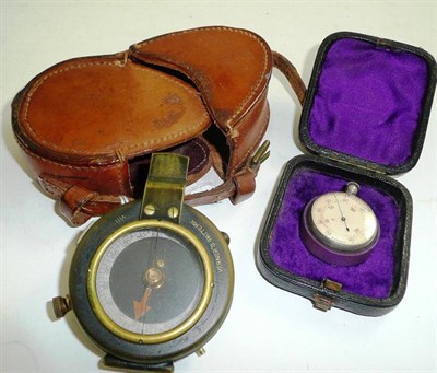 Lot 92 - A leather cased compass and another instrument, cased