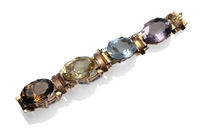 Lot 363 - A Multi-Gemstone Bracelet, six large oval cut stones in yellow claw settings, including aquamarine