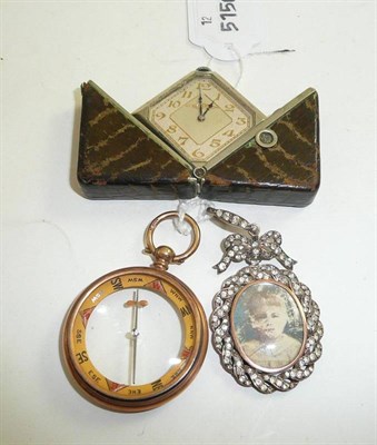 Lot 100 - A paste set locket, a compass and a purse watch
