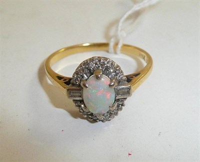 Lot 101 - An opal and diamond ring