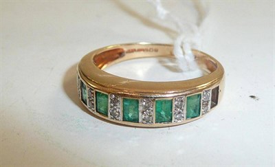 Lot 110 - A 9ct gold emerald and diamond band ring (one stone missing)