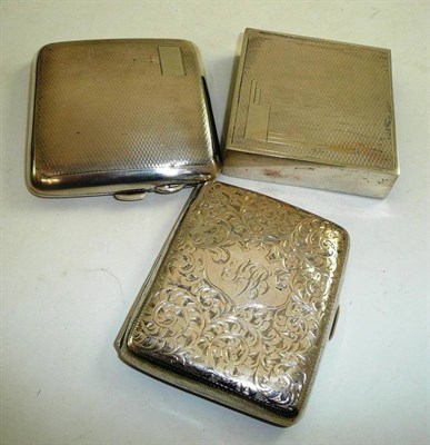 Lot 113 - Two silver cigarette cases and a silver sleeve (3)