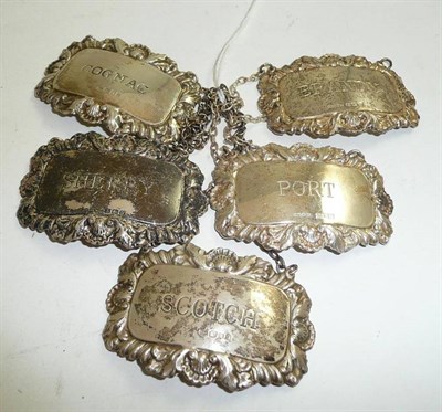 Lot 125 - Five silver decanter labels for Cognac, Port, Scotch, Brandy and Sherry