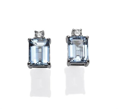 Lot 366 - A Pair of Aquamarine and Diamond Earrings, the emerald-cut aquamarines each surmounted by a...