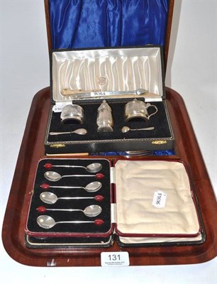 Lot 131 - Pair of bright cut Newcastle silver tongs, two cased sets of coffee bean terminal spoons,...