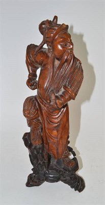 Lot 134 - A Chinese carved hardwood figure of Wudi