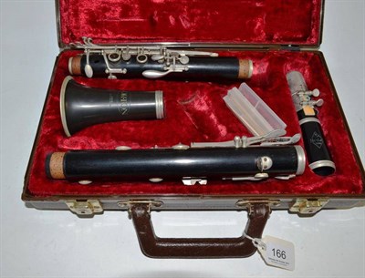 Lot 166 - A Corton clarinet, case and book