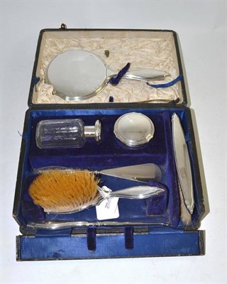 Lot 191 - A silver and glass cased dressing set