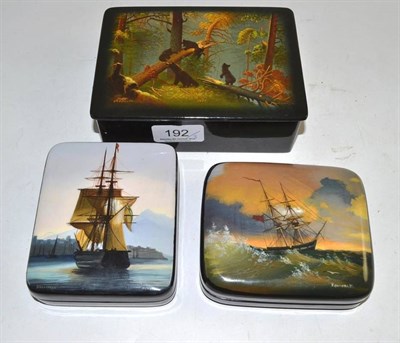 Lot 192 - Three Russian papier mache boxes painted with various scenes