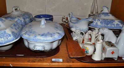 Lot 209 - A shelf including four Lladro figures and two Nao bears, pieces of china, blue and white...