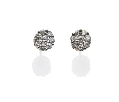 Lot 374 - A Pair of Diamond Cluster Stud Earrings, the round brilliant cut diamonds in yellow claw...