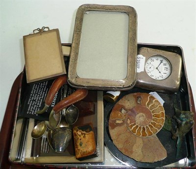 Lot 234 - Three silver photograph frames, pocket watch in silver frame, ammonite, black marble ashtray...