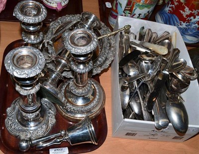 Lot 262 - A quantity of assorted plated ware including flatware, set of four candlesticks, bottle...