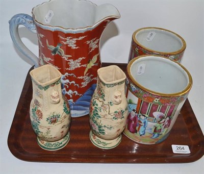 Lot 264 - A pair of Cantonese porcelain squat beaker vases, a large Japanese Imari porcelain jug, a pair...