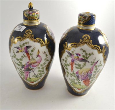 Lot 265 - A pair of Samson of Paris porcelain vases and covers in the Worcester style (a.f.)