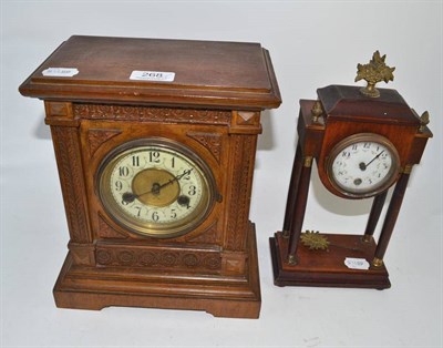 Lot 268 - An Edwardian portico clock and an oak mantel clock