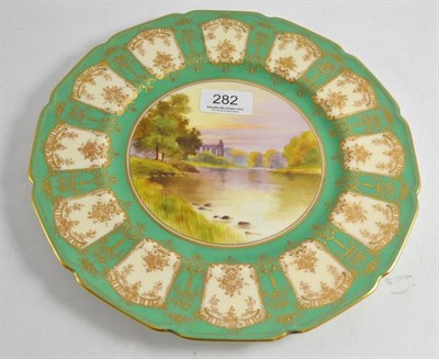 Lot 282 - A Royal Doulton porcelain plate of 'Bolton Abbey'