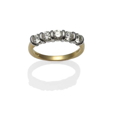 Lot 385 - An 18 Carat Gold Diamond Five Stone Ring, the round brilliant cut diamonds in white bar...