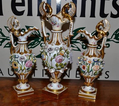 Lot 327 - A Davenport flower encrusted garniture with griffin handles (a.f.)