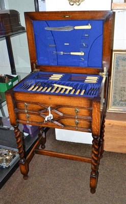 Lot 328 - An oak table canteen of plated cutlery