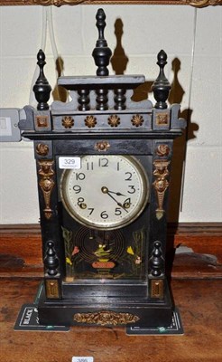 Lot 329 - An Aichi shelf clock in an ebonised case