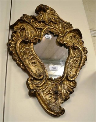 Lot 388 - An 18th century gilt gesso mirror