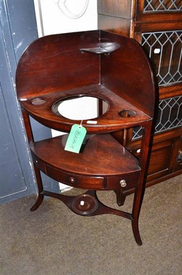 Lot 391 - A mahogany corner washstand