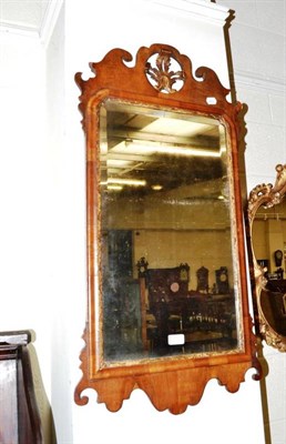 Lot 395 - Mahogany fret carved wall mirror