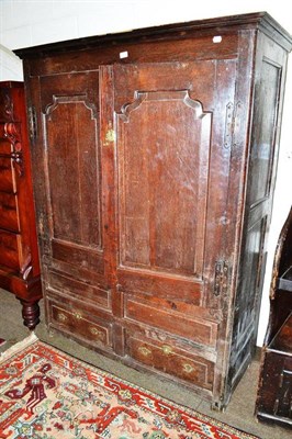 Lot 397 - 18th century oak livery cupboard with fielded panel doors