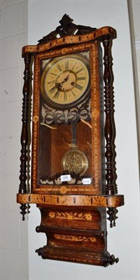 Lot 406 - An inlaid striking wall clock