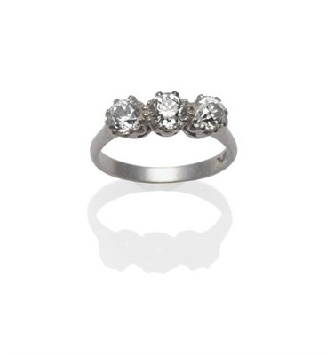 Lot 393 - A Diamond Three Stone Ring, circa 1910, the graduated old cut diamonds, in white claw settings,...